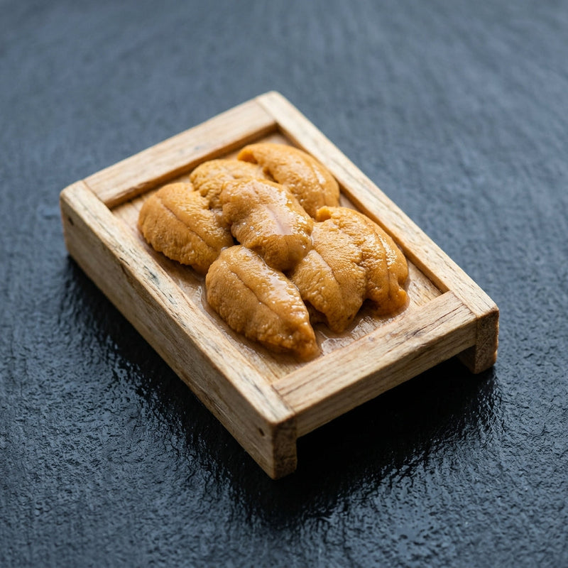 Kina (Sea Urchin Roe) on dark slate at Ghan Bros Seafood, Fyshwick