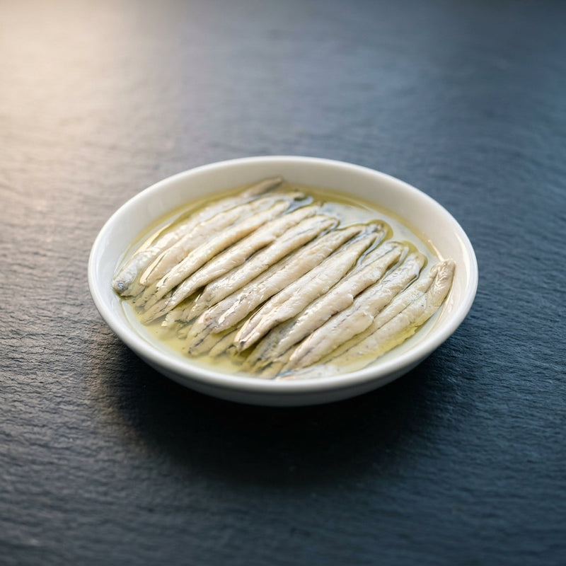 Marinated Anchovies on dark slate at Ghan Bros Seafood, Fyshwick